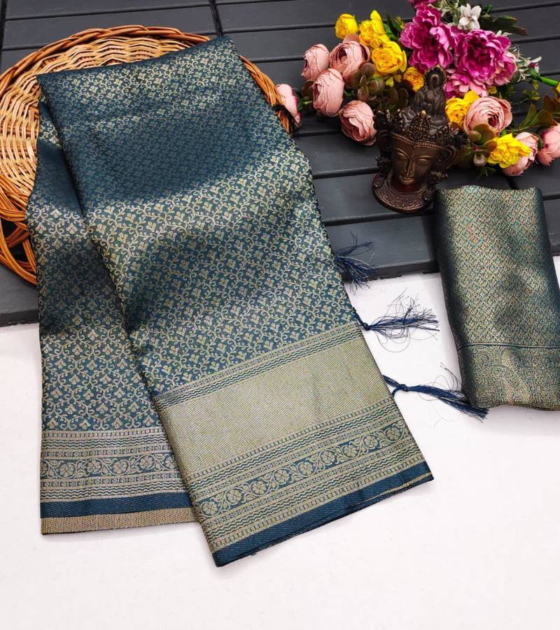 Teal silk blend woven saree with zari work