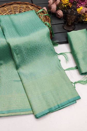 Sea green silk blend woven saree with zari work