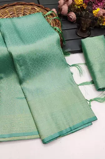 Sea green silk blend woven saree with zari work