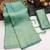 Sea green silk blend woven saree with zari work