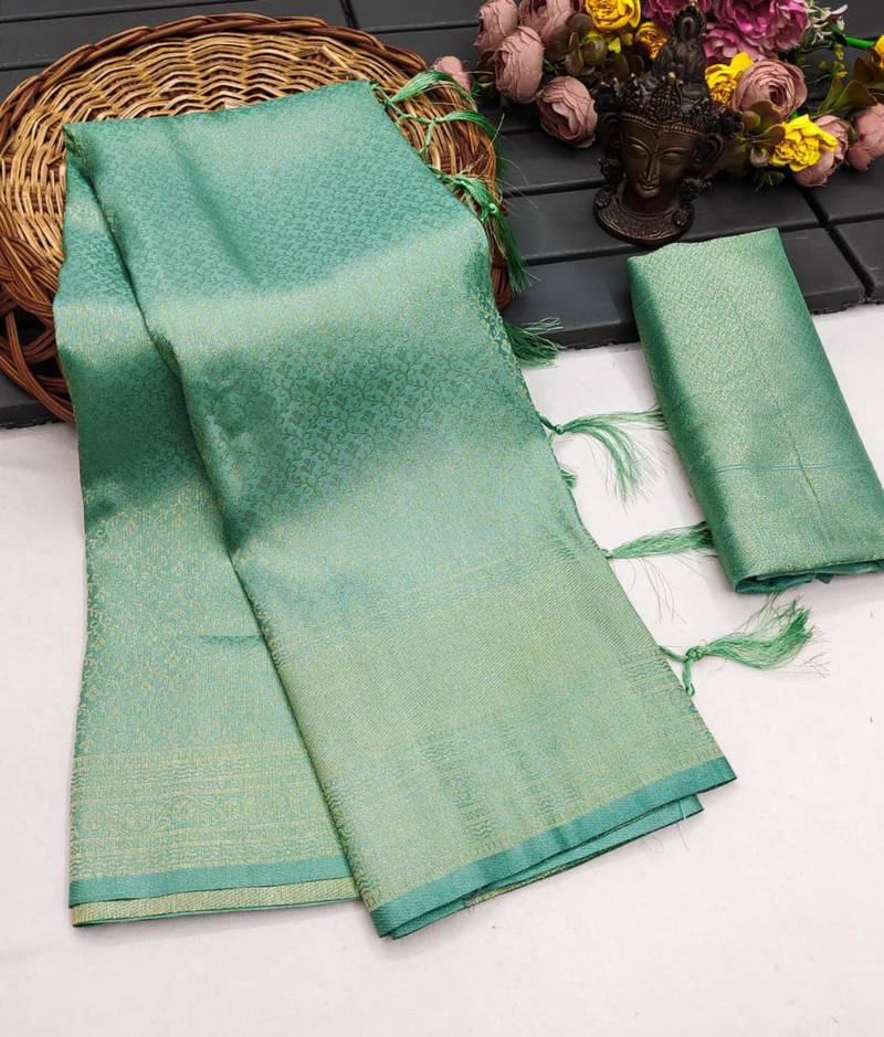 Sea green silk blend woven saree with zari work