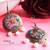 Round brass earrings with blue highlights