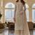Beige color girlie butterfly net ceremonial salwar kameez for glamorous looks
