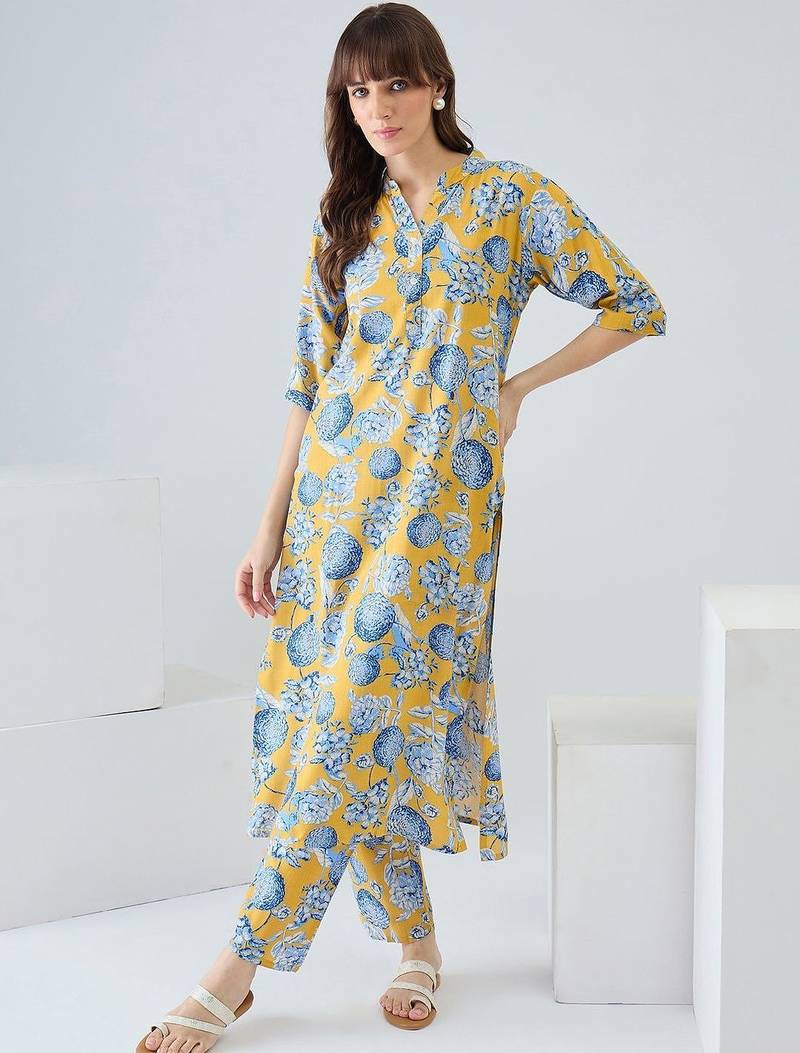 Yellow women floral printed regular kurta with trousers