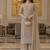 Beige color girlie butterfly net ceremonial salwar kameez for glamorous looks