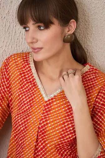 Orange leheriya printed pleated v-neck sequins pure cotton a-line kurta