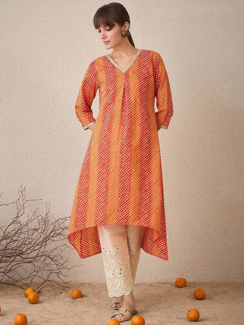 Orange leheriya printed pleated v-neck sequins pure cotton a-line kurta