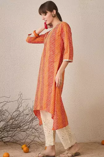 Orange leheriya printed pleated v-neck sequins pure cotton a-line kurta