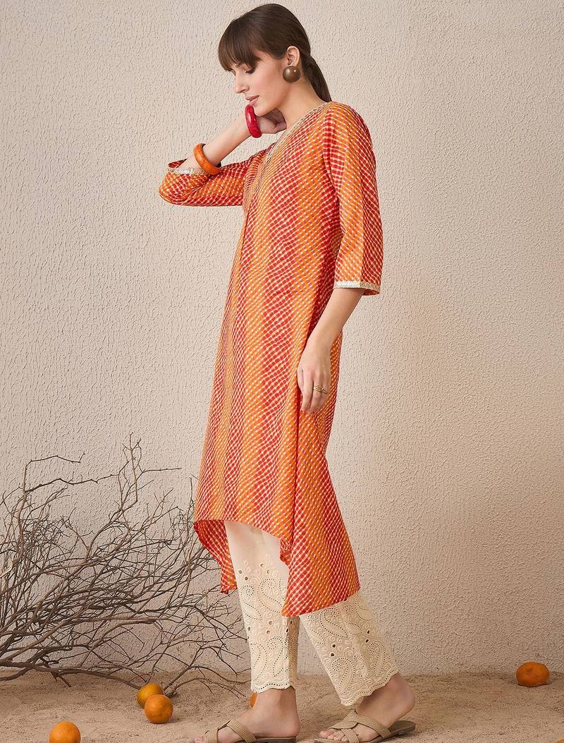 Orange leheriya printed pleated v-neck sequins pure cotton a-line kurta