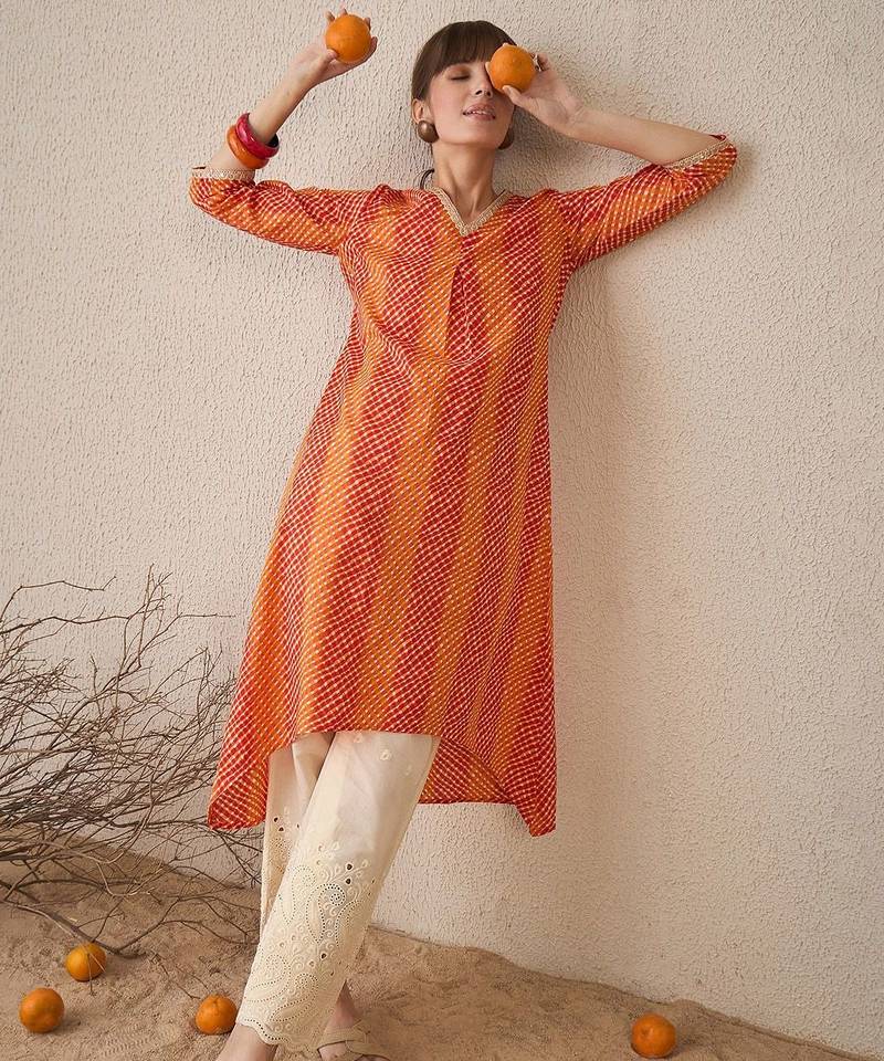 Orange leheriya printed pleated v-neck sequins pure cotton a-line kurta