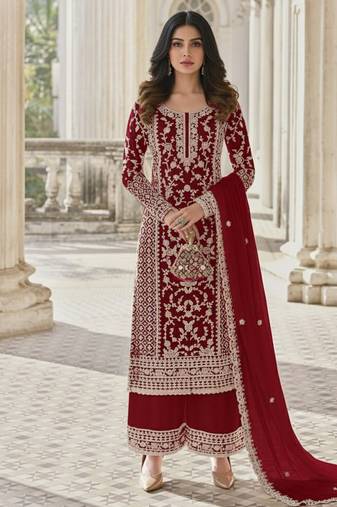 Burgundy color girlie butterfly net ceremonial salwar kameez for glamorous looks