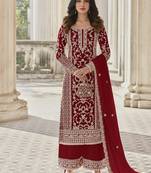 Burgundy color girlie butterfly net ceremonial salwar kameez for glamorous looks