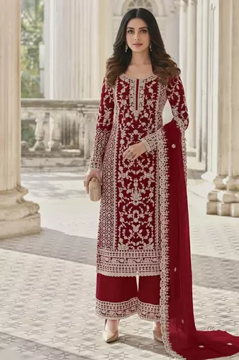 Burgundy color girlie butterfly net ceremonial salwar kameez for glamorous looks