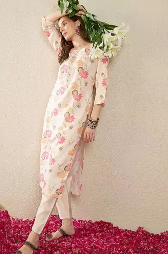 Cream women floral printed thread work floral kurta