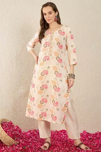Cream women floral printed thread work floral kurta