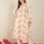 Cream women floral printed thread work floral kurta