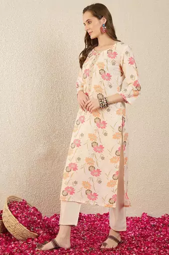 Cream women floral printed thread work floral kurta