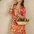 Orange floral screen printed v-neck straight kurta with trousers