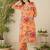 Orange floral screen printed v-neck straight kurta with trousers