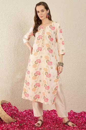 Cream women floral printed thread work floral kurta