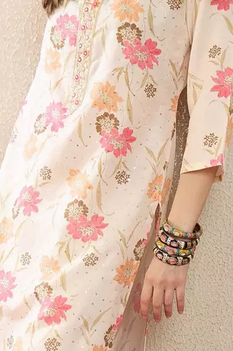 Cream women floral printed thread work floral kurta