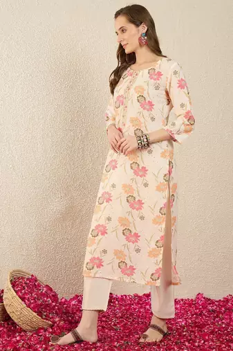Cream women floral printed thread work floral kurta