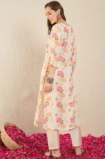 Cream women floral printed thread work floral kurta