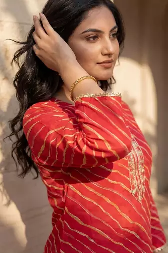 Red women leheriya printed mirror work kurta