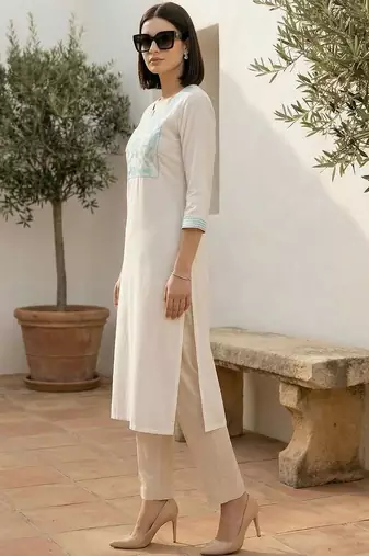 White women embroidered thread work kurta