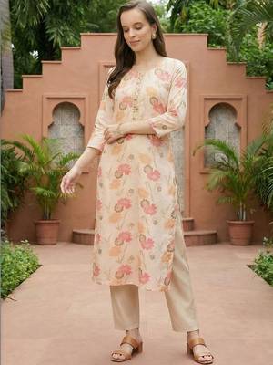 Cream women floral printed thread work floral kurta 1