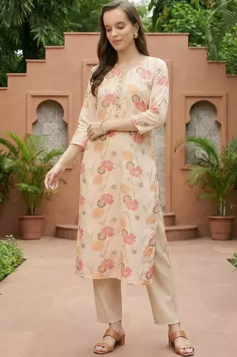 Cream women floral printed thread work floral kurta