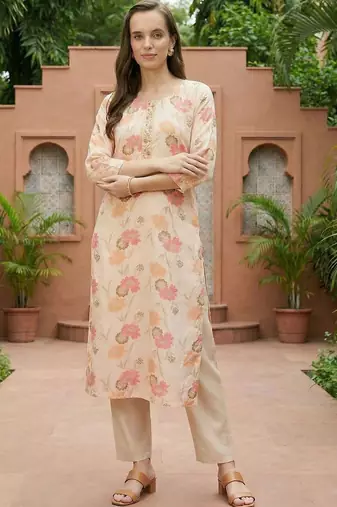 Cream women floral printed thread work floral kurta