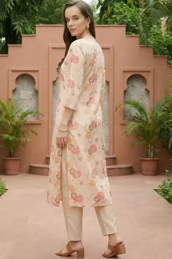 Cream women floral printed thread work floral kurta