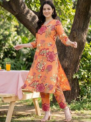 Orange women floral printed kurta with trousers 1
