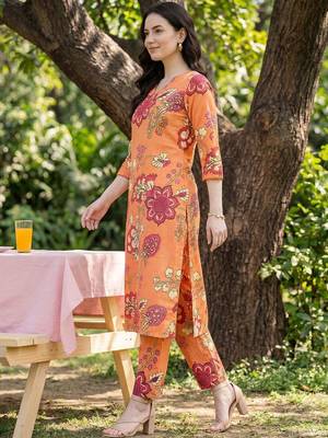 Orange women floral printed kurta with trousers 3