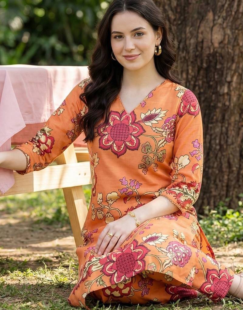 Orange women floral printed regular kurta with trousers