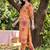 Orange women floral printed regular kurta with trousers
