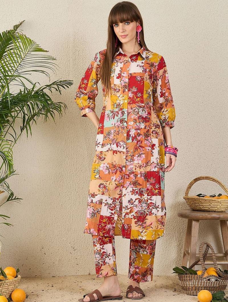 Yellow women floral printed regular pure cotton kurta with trousers