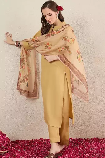 Beige women solid kurta with trousers & dupatta