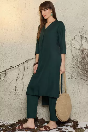 Green pleated v-neck a-line kurta with trousers