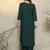 Green pleated v-neck a-line kurta with trousers