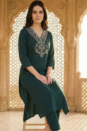 Green women ethnic motifs embroidered regular thread work kurta with trousers