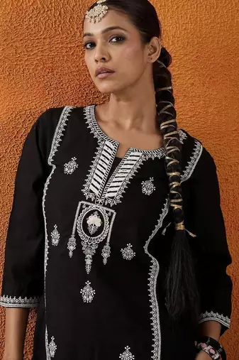 Black women ethnic motifs embroidered thread work kurta