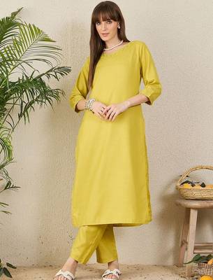 Green women solid kurta with trousers 1