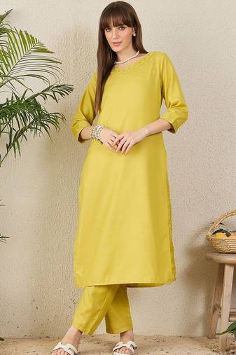 Green women solid kurta with trousers