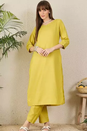 Green women solid kurta with trousers