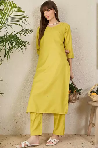 Green women solid kurta with trousers