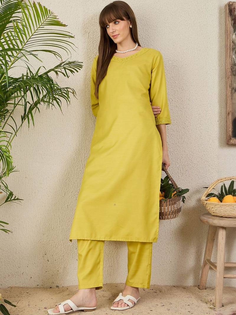 Green women solid kurta with trousers