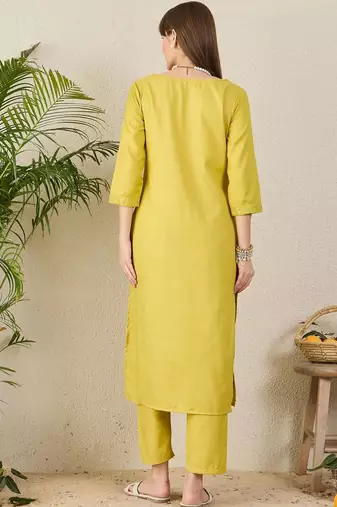 Green women solid kurta with trousers