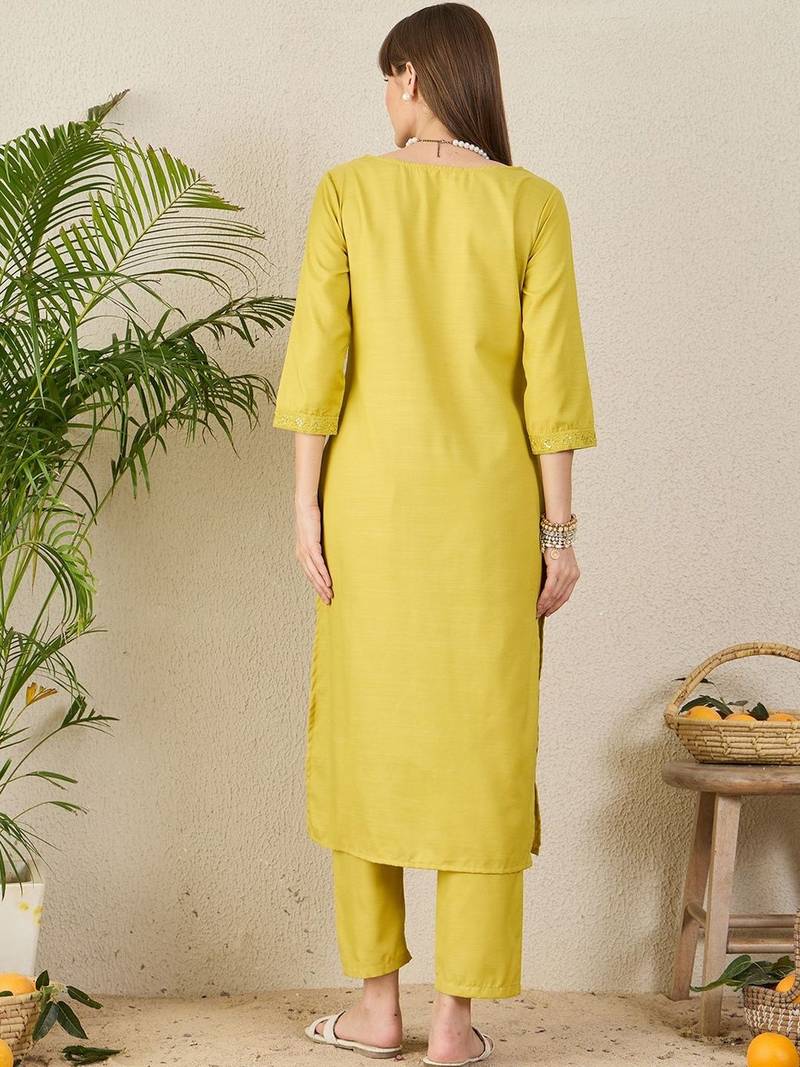 Green women solid kurta with trousers